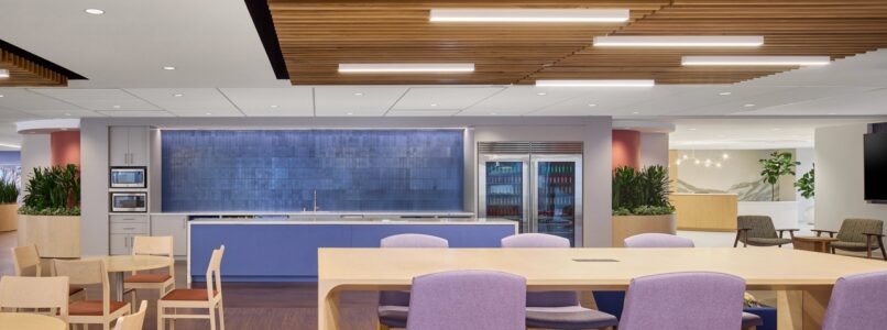 Cafe with lavender chairs, wood tables and a wood-slat ceiling in the Hilton Dallas office