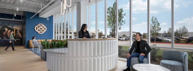 Reception desk and lounge seating at The Chicago School Dallas campus